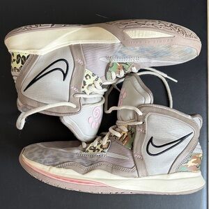 Woman’s size 7 Nike Kyrie Infinity Mid Leopard Camo